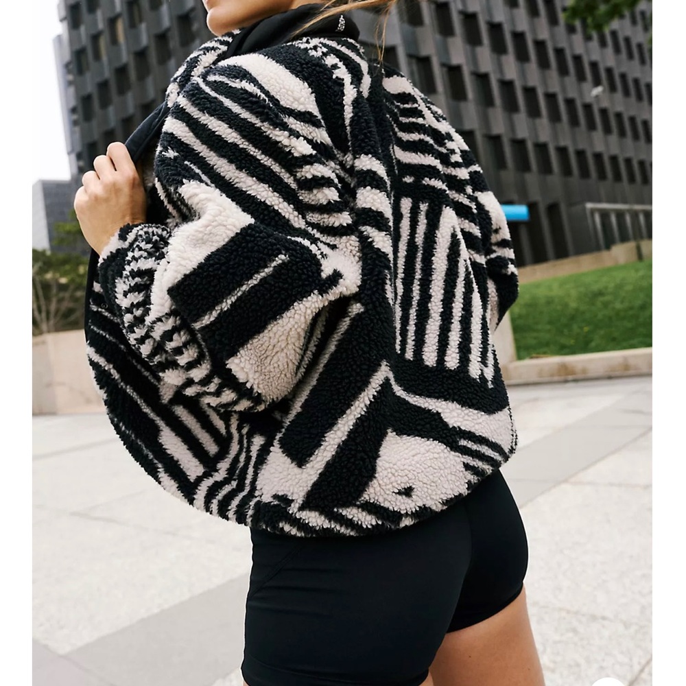 Free People movement size small. Black and white fleece.